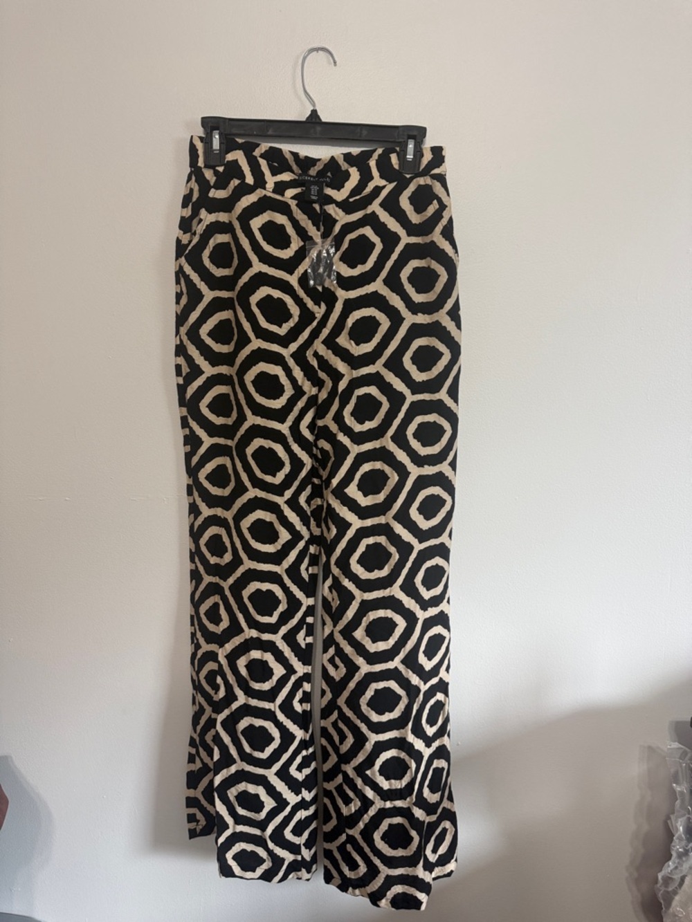 Sincerely Jules Geometric Wide-Leg Trousers in a cream and black abstract print